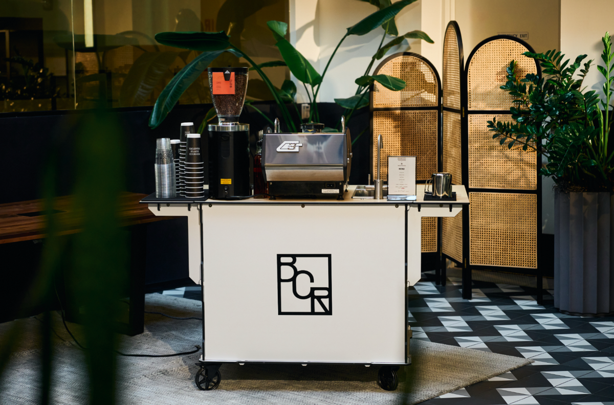 Boxwood Coffee mobile espresso cart set up at an event